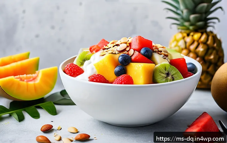 밀프렙으로 만드는 간편한 디저트 아이디어 - A vibrant and fresh fruit salad bowl featuring local Malaysian fruits such as ripe mangoes, papayas,...